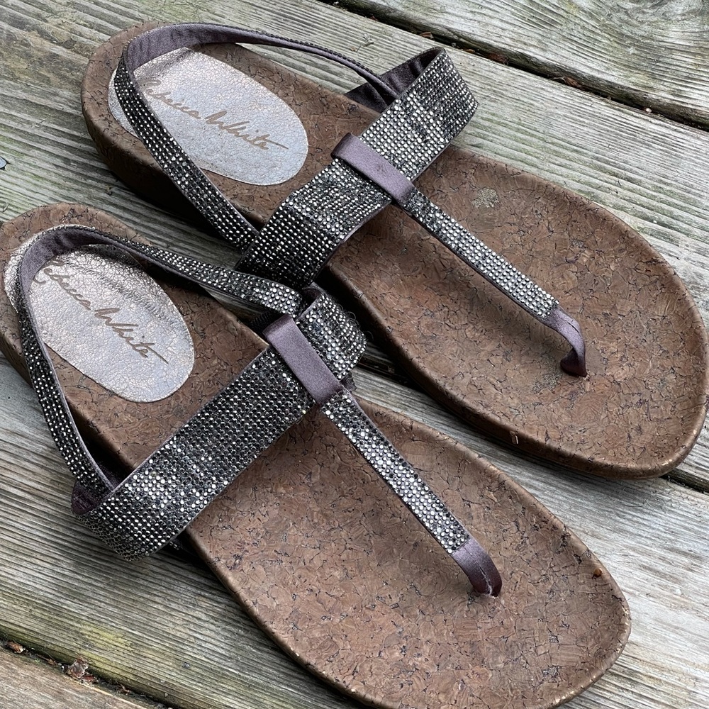 Cork based toe strap sandals. Very comfortable.